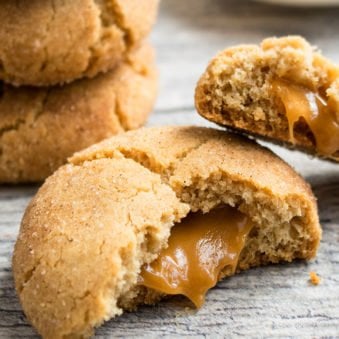 Easy Stuffed Caramel Snickerdoodles Cookies on Rustic Gray Background- Broken in Half.