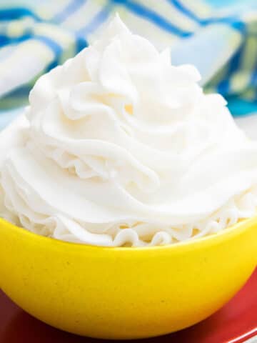 Best Easy Classic American Buttercream Frosting in Yellow Bowl.