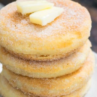 Stack of Easy Cinnamon Pancakes With Slices of Butter on Top.