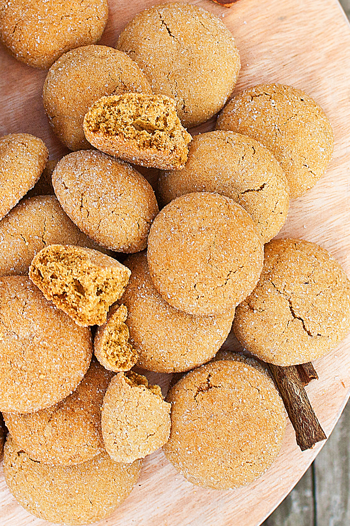 Whole and Partially Eaten Cookies on Rustic Wood Background. 
