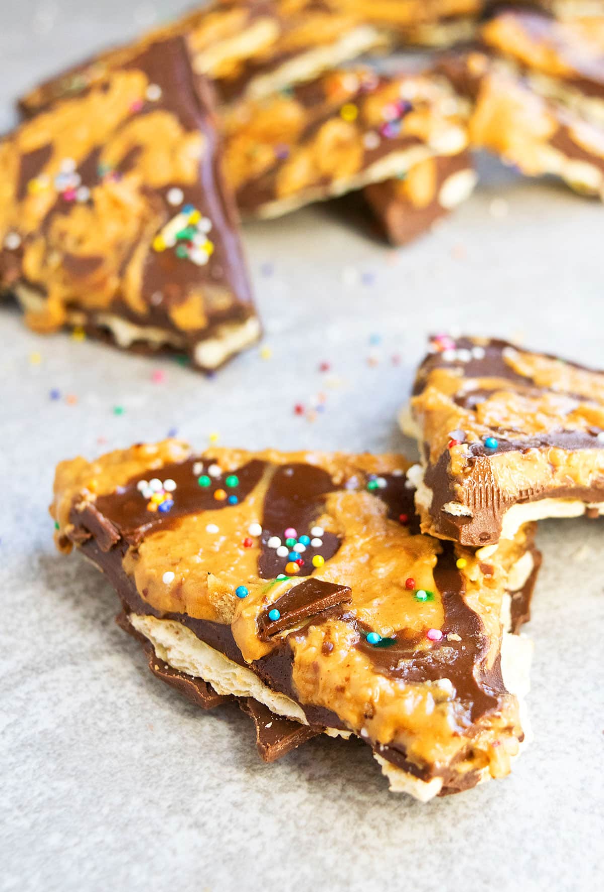 Easy Peanut Butter Chocolate Bark Candy on Light Gray Background. 
