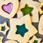 Easy Christmas Stained Glass Cookies on Gray Baking Tray.