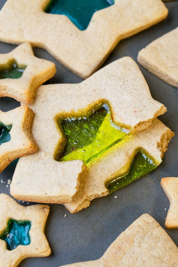 Partially Eaten Jolly Rancher Cookies on Gray Baking Tray.