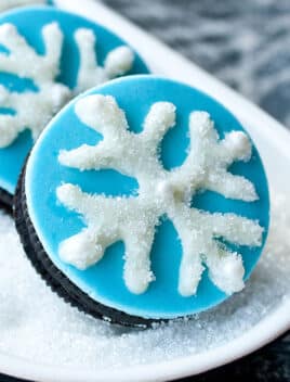 Easy Snowflake Cookies (Snowflake Oreos) on White Dish
