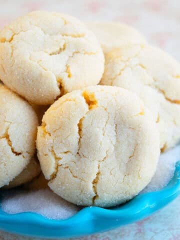Easy No Chill Soft and Chewy Sugar Cookies in Blue Dish.