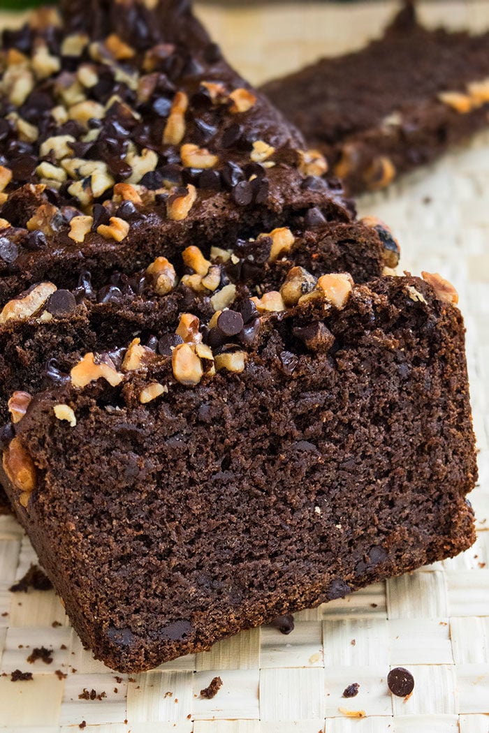 Slices of Easy Chocolate Banana Bread With Cake Mix on Straw Tray. 