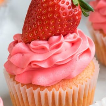 Easy Strawberry Cupcakes With Strawberry Frosting on White Dish.