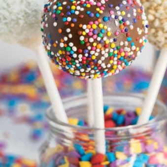 Easy Homemade Cake Pops in Glass Jar of Sprinkles.