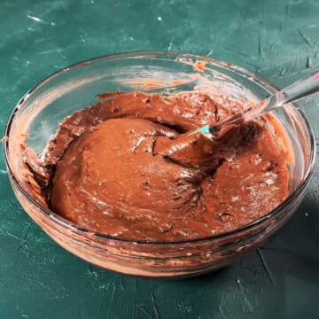 Cake batter mixed together with a spatula. 