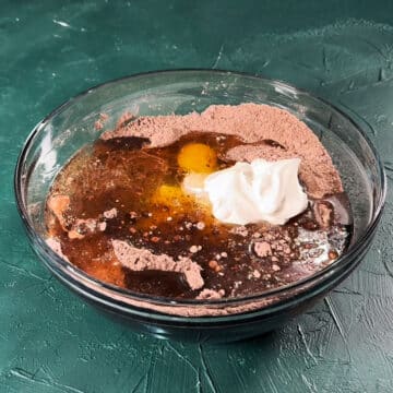 Wet ingredients added to dry mixture in large bowl. 