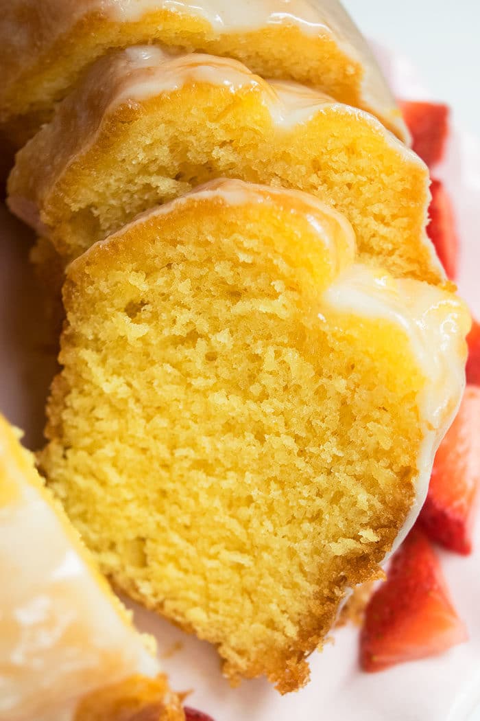 Easy Homemade Lemon Bundt Cake With Cake Mix on White Dish. 