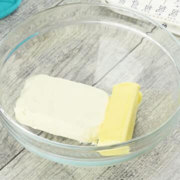 Butter and cream cheese in a glass bowl. 