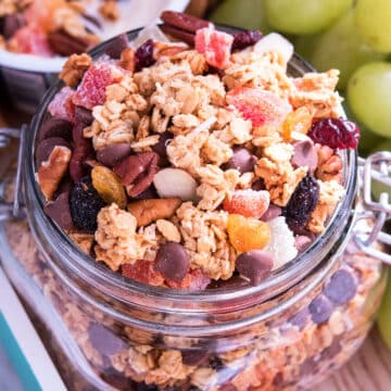Easy homemade crunchy granola in glass jar- Closeup shot.