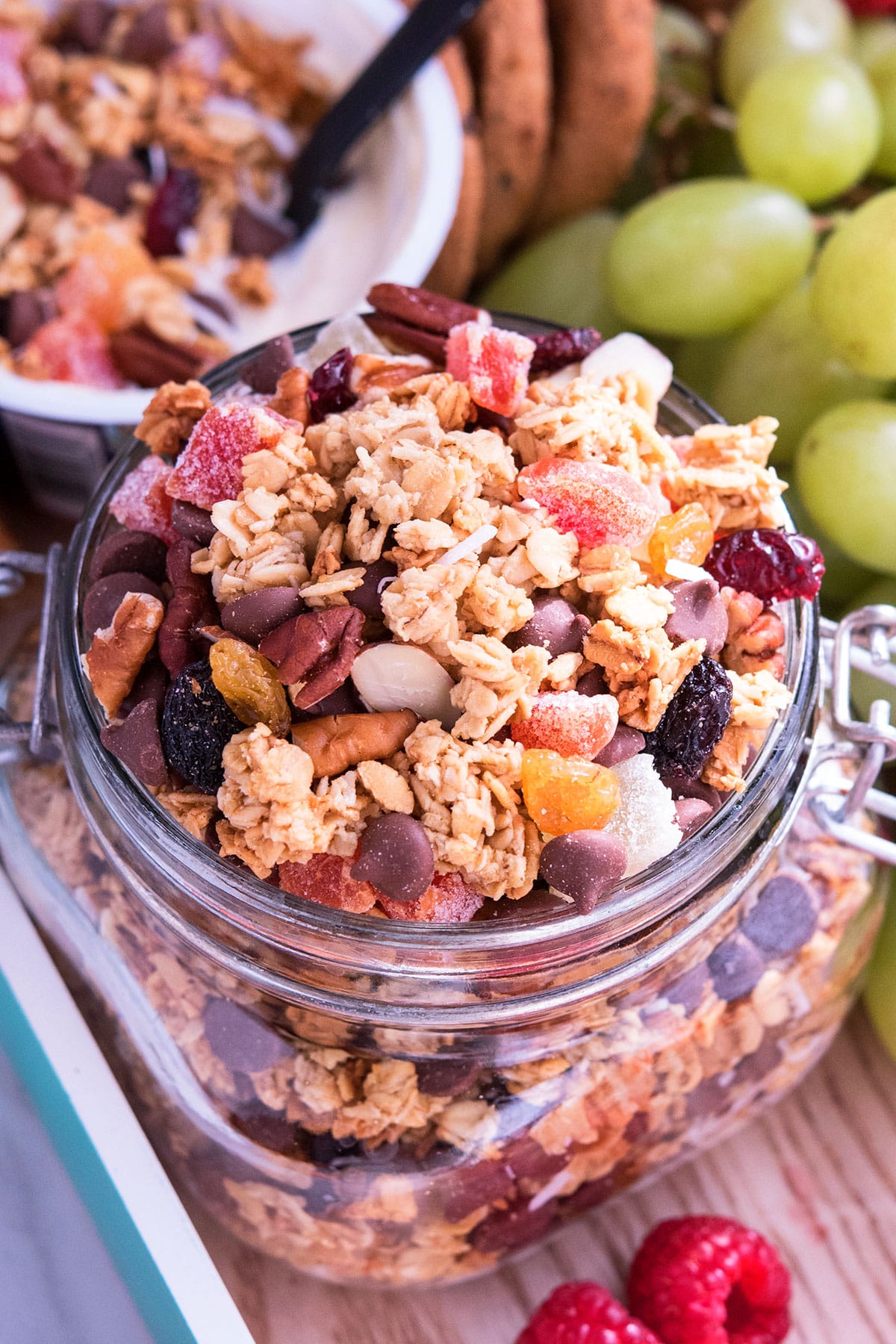 Easy crunchy homemade granola in glass jar. 