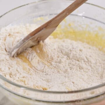 Dry flour mixture being mixed into the wet mixture.