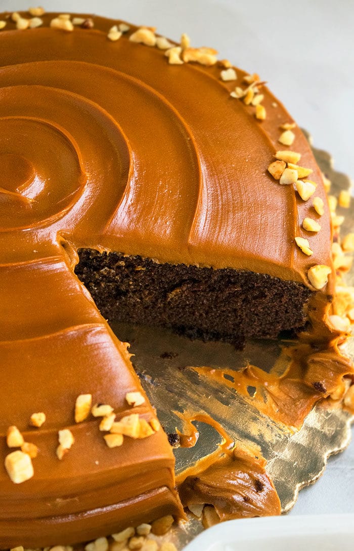 Homemade Caramel Cake With One Slice Removed. 