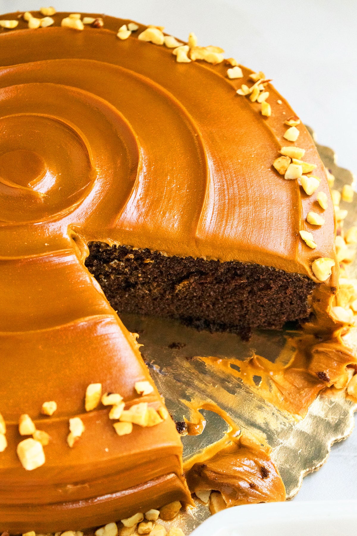 Round Cake With One Slice Removed. 