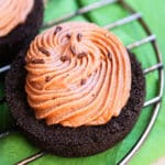 Easy creamy mini no bake Nutella cheesecake with Oreo crust on cooling rack.