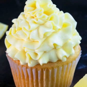 Easy Lemon Frosting Recipe (Lemon Buttercream) Swirled on Top of Cupcake