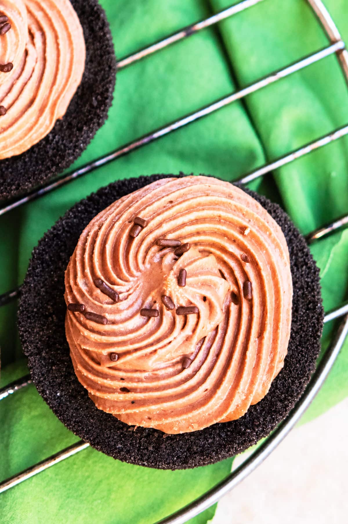 Overhead shot of no bake hazelnut cheesecake on cooling rack. 