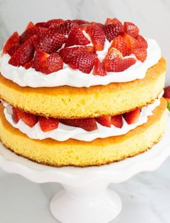 Easy Strawberry Shortcake Cake With Cake Mix on White Cake Stand