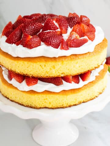 Easy Strawberry Shortcake Cake With Cake Mix on White Cake Stand