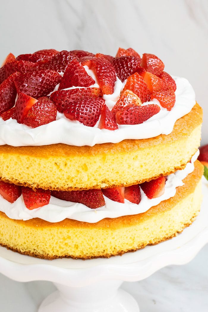Easy Strawberry Shortcake Cake With Cake Mix on White Cake Stand 