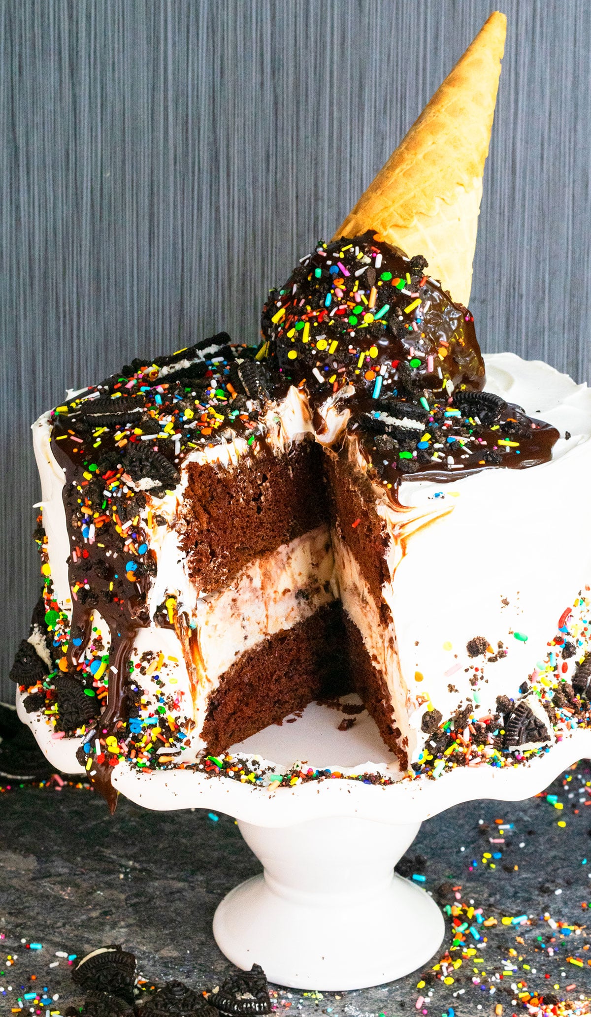 Frozen cake with one slice cut out.