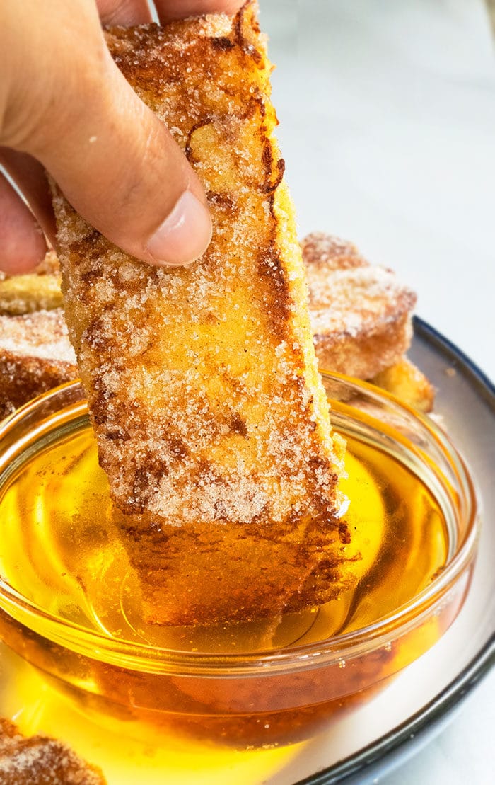 French Toast Sticks Dipped in Maple Syrup