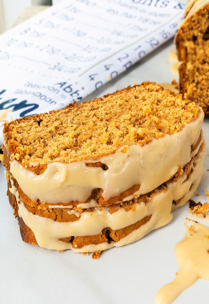Stack of Slices of Cake Mix Pumpkin Bread on White Marble Background.  