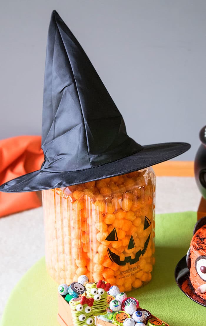 Spooky Party Snacks Decorated With a Witch Hat