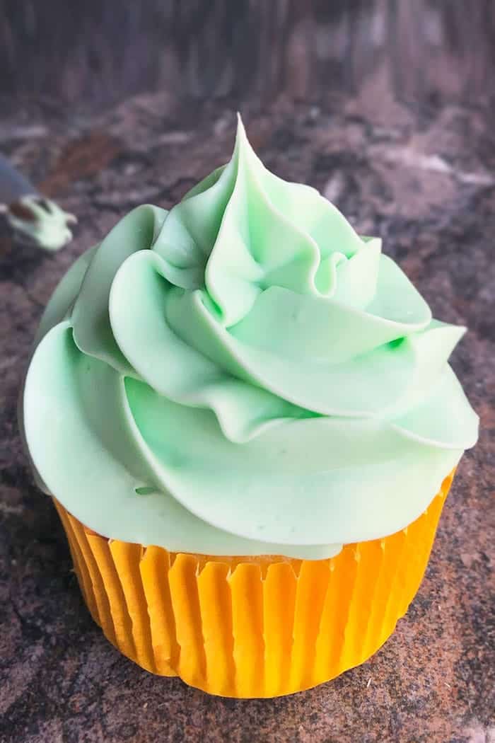 green frosting cupcake