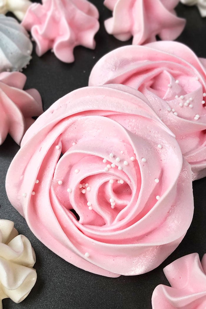 Egg White Cookies Piped in Rose Shape on Gray Dish 