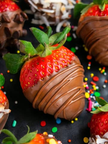 Easy Homemade Chocolate Covered Strawberries on Black Dish