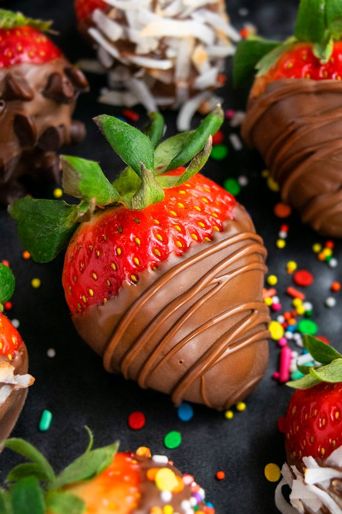 Easy Homemade Chocolate Covered Strawberries on Black Dish- Closeup Shot 