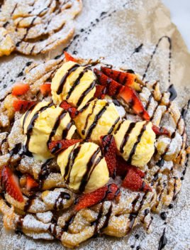 Easy Homemade Funnel Cake With Vanilla Ice Cream, Strawberries, Chocolate Syrup