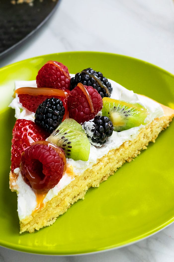 Homemade Fruit Pizza Cookie Slice on Green Plate