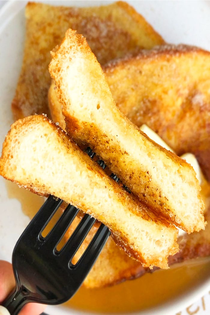 Closeup of Homemade French Toast on Black Fork