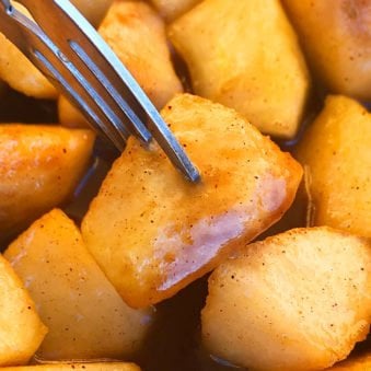 Closeup Shot of Homemade Cinnamon Apples on a Fork