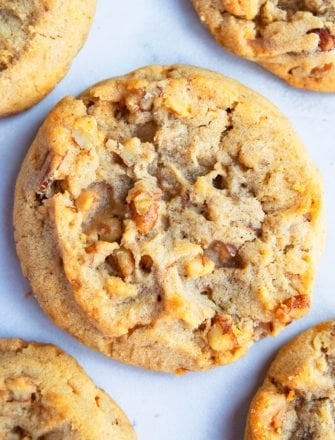 Closeup shot of Homemade Butter Pecan Cookies on White Background