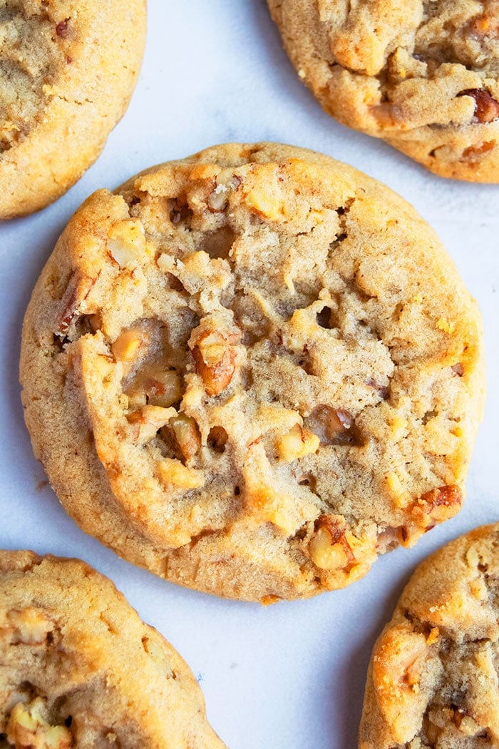 Closeup shot of Homemade Butter Pecan Cookies on White Background