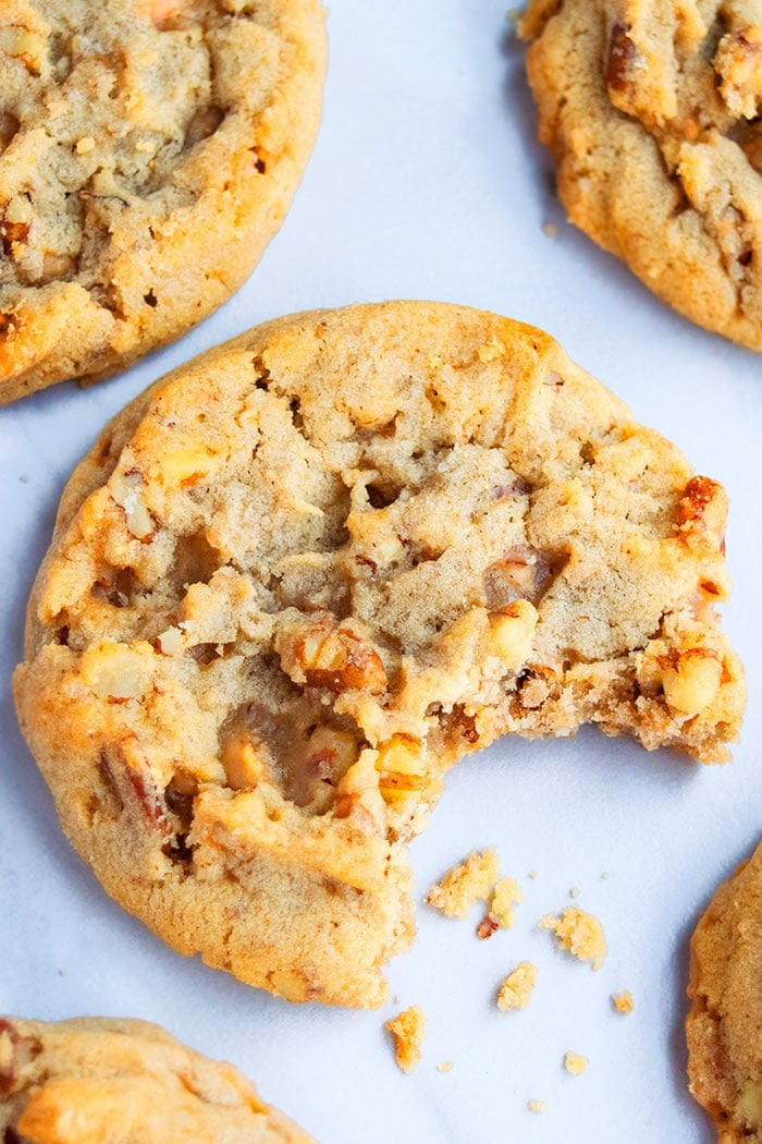 Soft and Chewy Pecan Cookies with Bite Removed