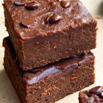 Easy Homemade Pumpkin Brownies Slices Stacked on Top of Each Other
