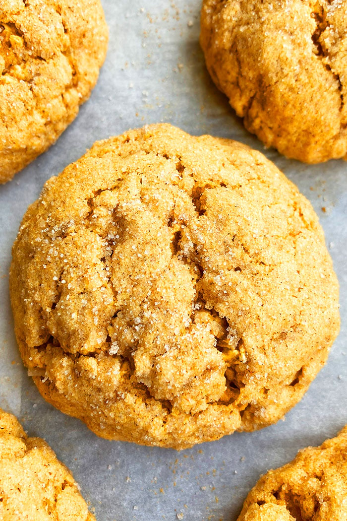 Closeup Shot of Homemade Pumpkin Spice Cookies on White Parchment Paper