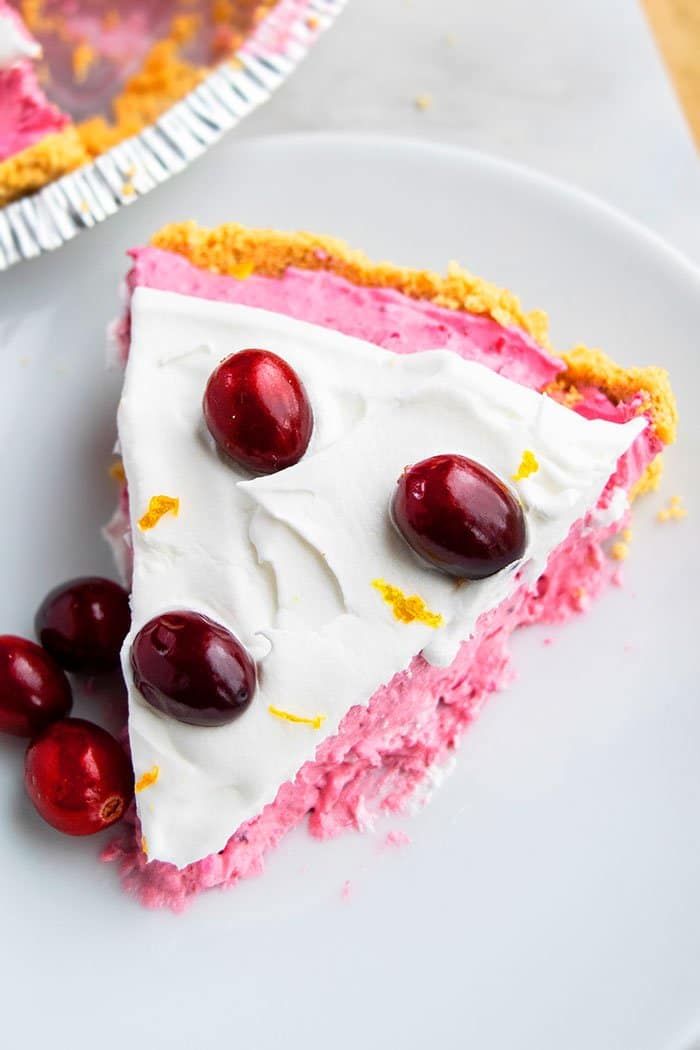 Slice of Homemade Cranberry Pie in White Plate