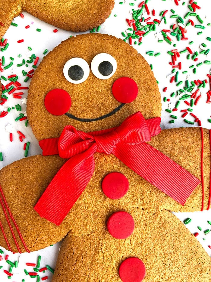 Closeup Shot of Cut Out Gingerbread Cookies With Cake Mix, Placed on White Background