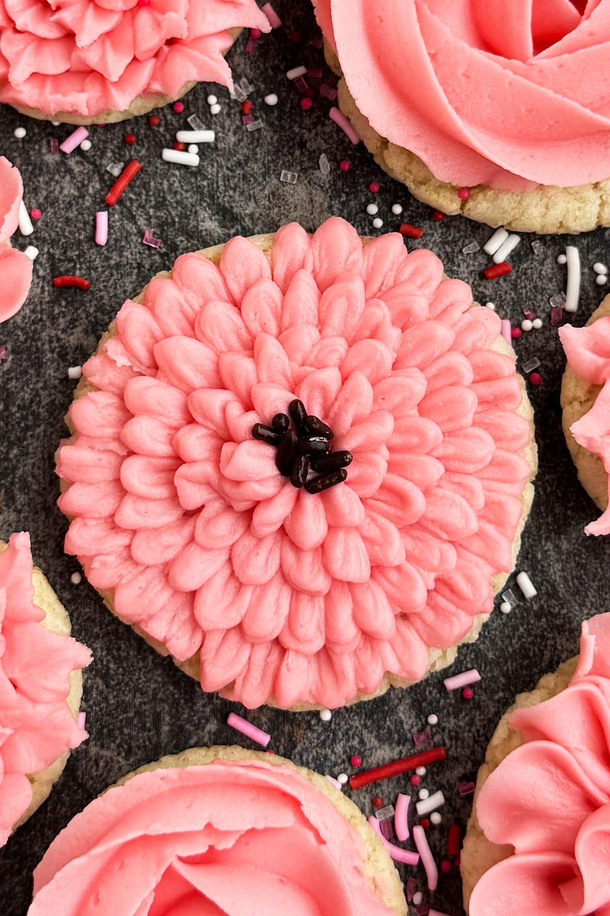 Homemade Sugar Cookies Iced With Pink Buttercream Frosting.