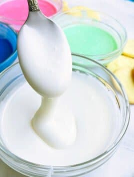 Easy White Glace Icing in Glass Bowl For Cookie Decorating
