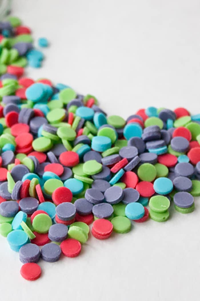 DIY Sprinkles Arranged in a Heart Shape on White Surface