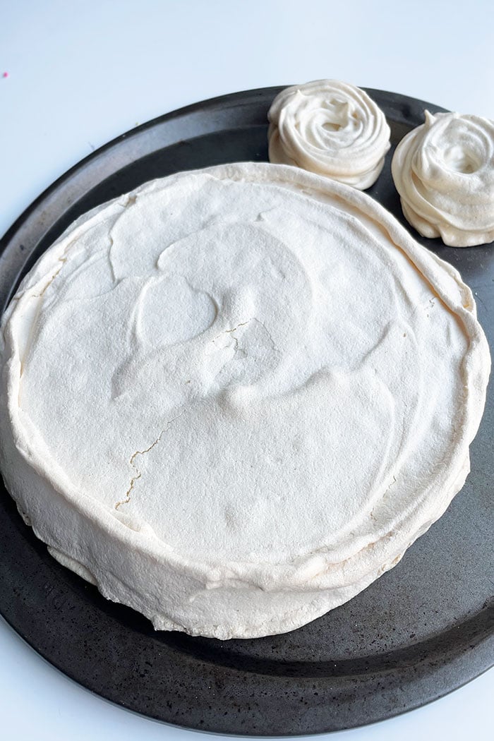 Undecorated Pavlova on Round Steel Tray